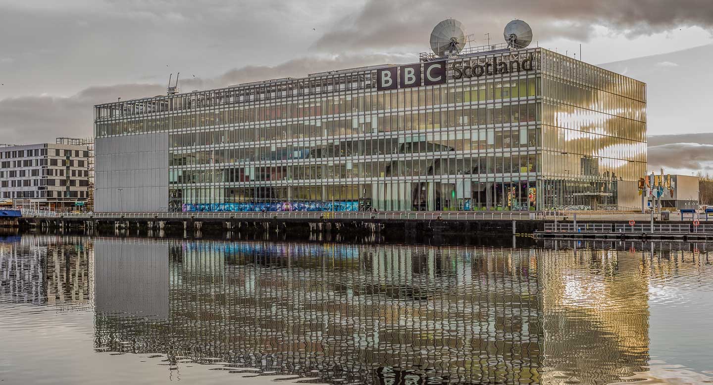 BBC SCOTLAND
The glass and steel HQ of the BBC in Scotland glimmers in the winter air, and its reflection in the waters of the Clyde